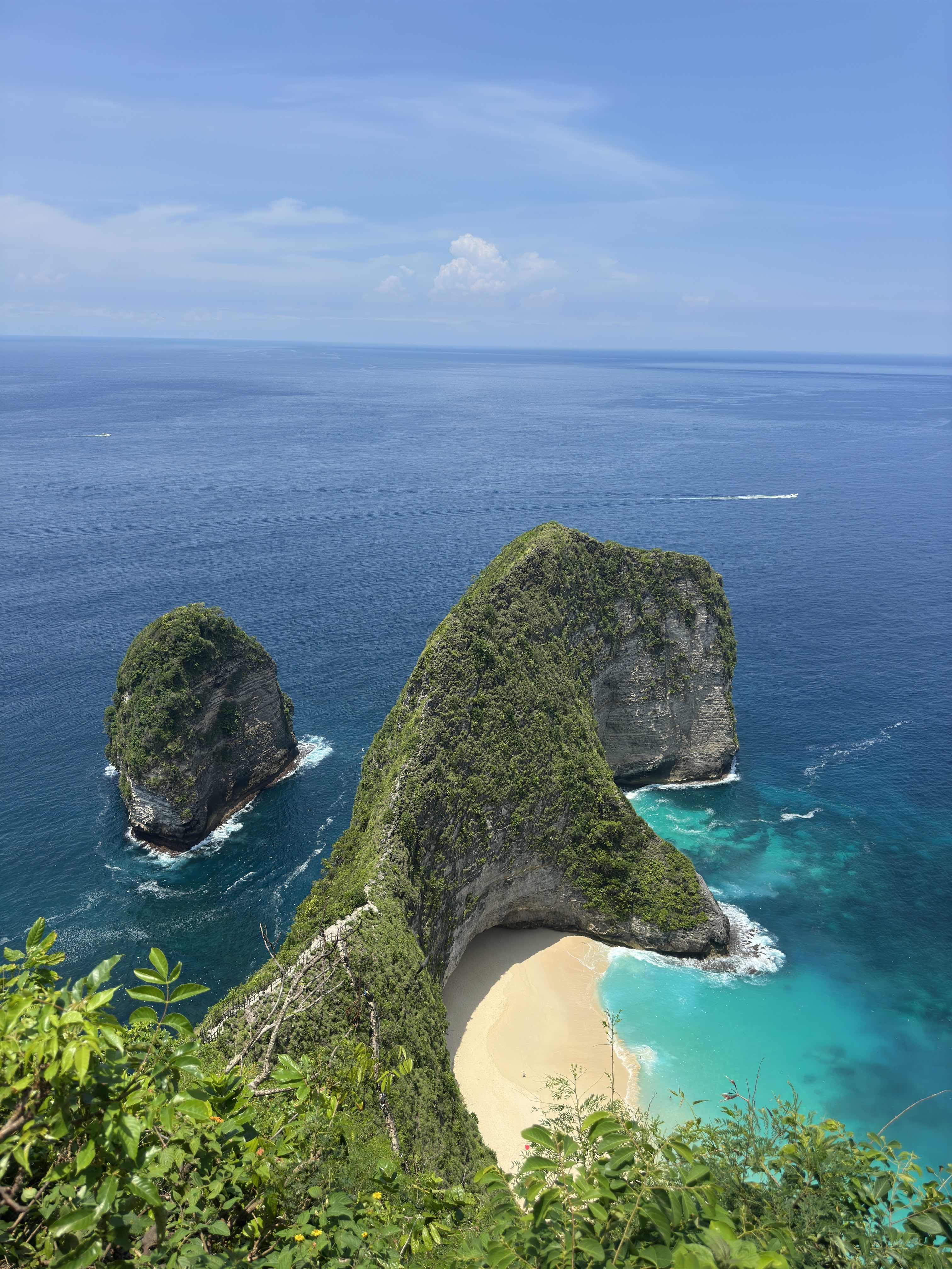 Isaiah Francois with scenic travel backdrop.